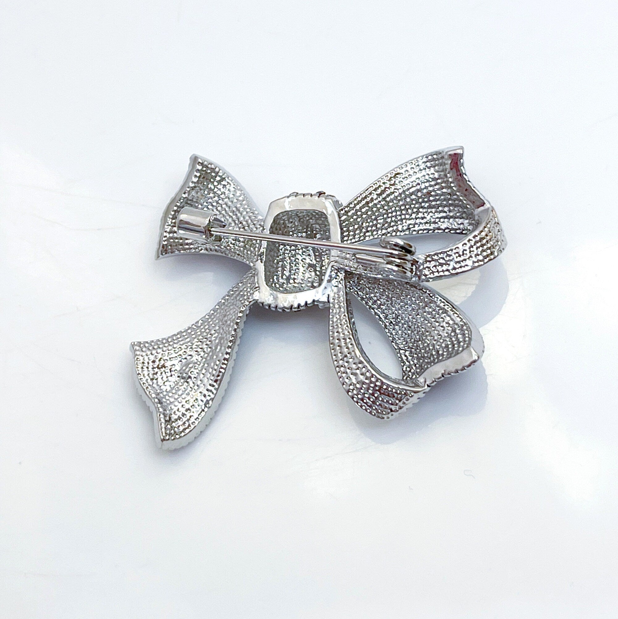 Silver hot sale bow brooch